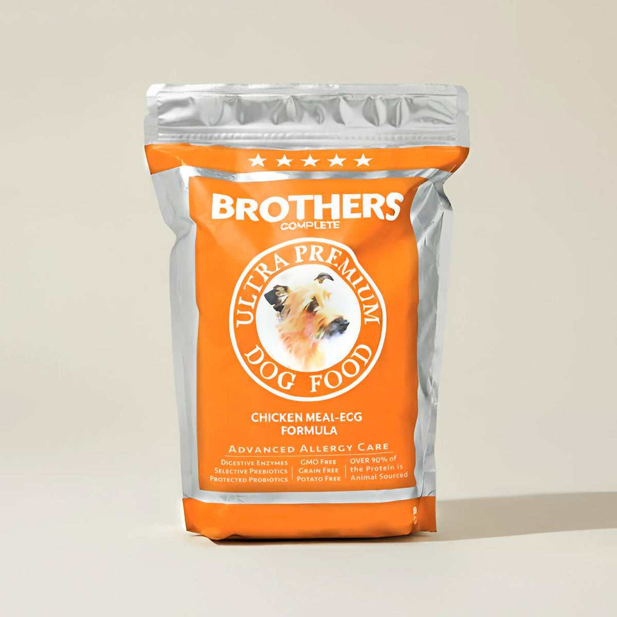 Brothers Complete ultra premium dog food package on a beige background