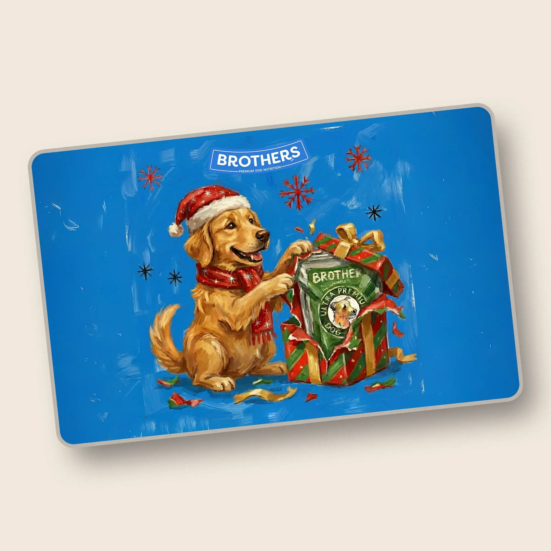 Dog with Santa hat holding a gift bag on a blue gift card with 'Brothers' branding