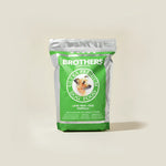Brothers Complete dog food package on a beige background