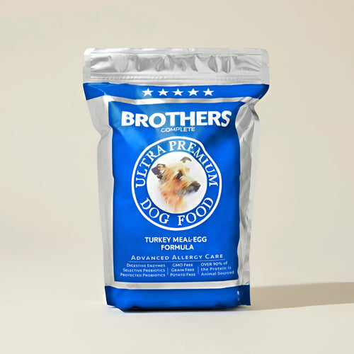 Brothers Complete Ultra Premium Dog Food package on a beige background